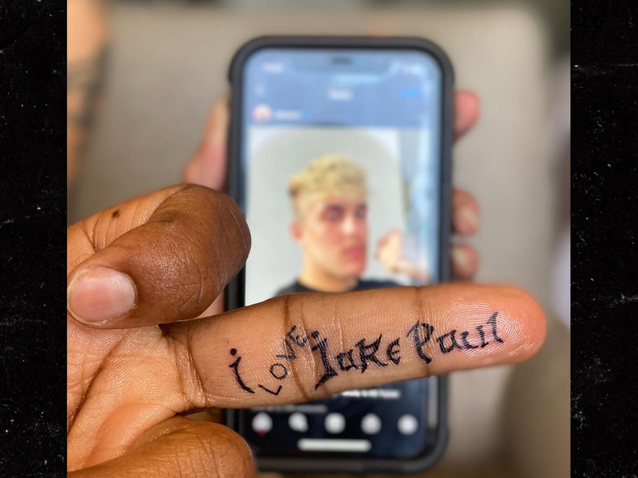 Tyron Woodley gets 'I love Jake Paul' tattoo on middle finger and urges You  Tube star to 'come and get this a** whippin' | The US Sun