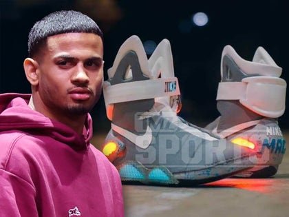 Rolly Romero Beside His Suctom Boxing Shoes