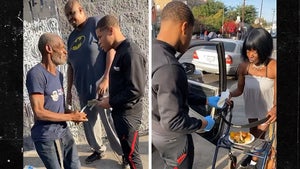 Boxing Star Devin Haney Serves Up Shrimp, Crab Legs & Cash To Homeless