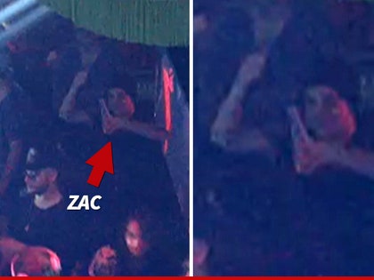 0801-zac-efron-drinking-tmz-01