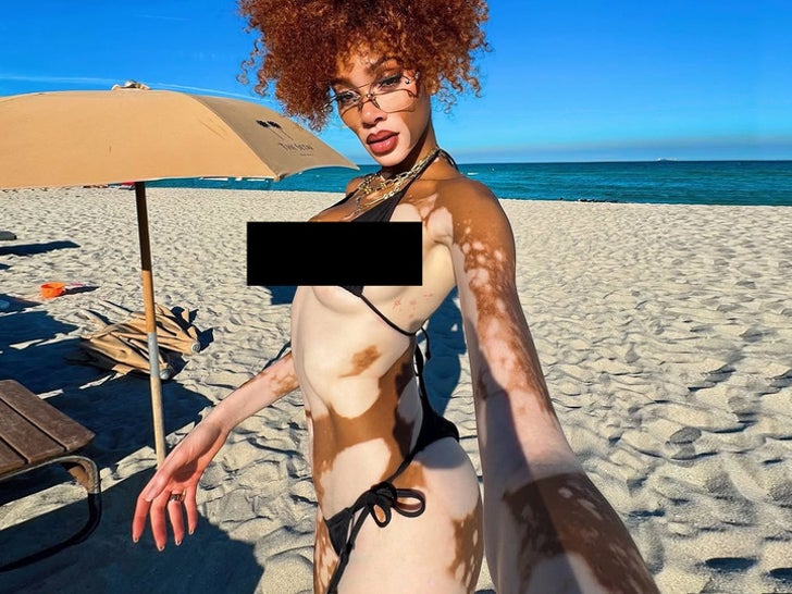 0520-Winnie-Harlow-Black-Bikini-Beach-Selfies-SUB1_720