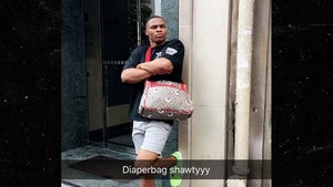 Russell Westbrook Shows Off $1,500 Gucci Diaper Bag Swag