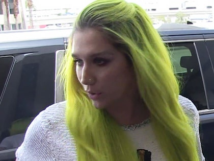 1222-kesha-tmz-01