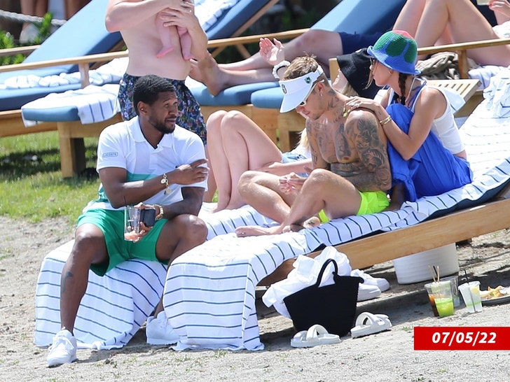 Usher e Justin Bieber no backgrid 1 do Lago Couer d'Alene
