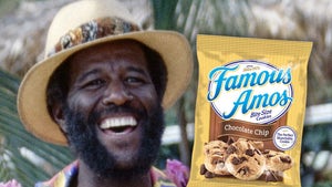 Wally Amos Next To His Cookies