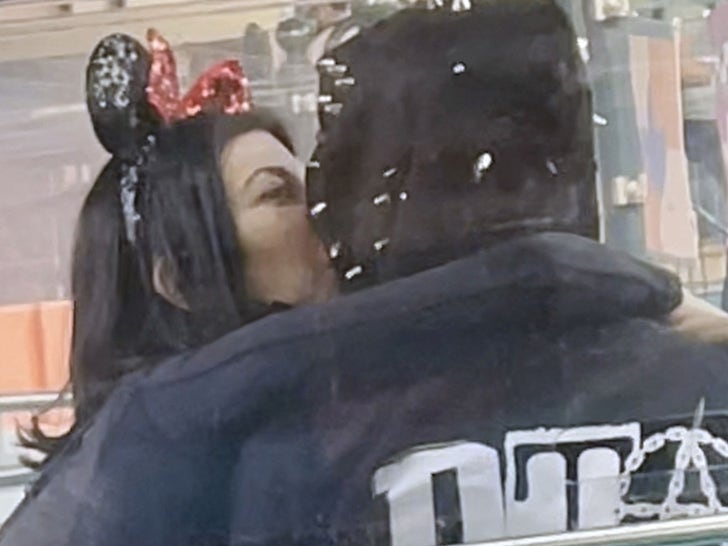 Kourtney Kardashian and Travis Barker Pack on PDA at Disneyland Paris