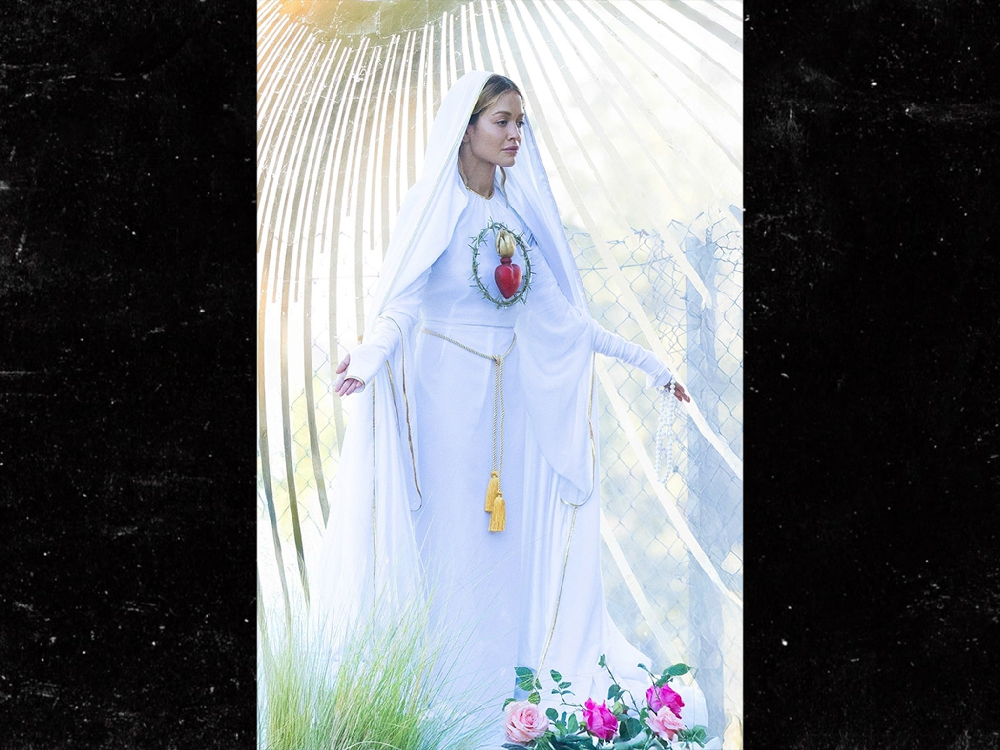Rita Ora Poses in Virgin Mary Get-Up Outside Capitol Records