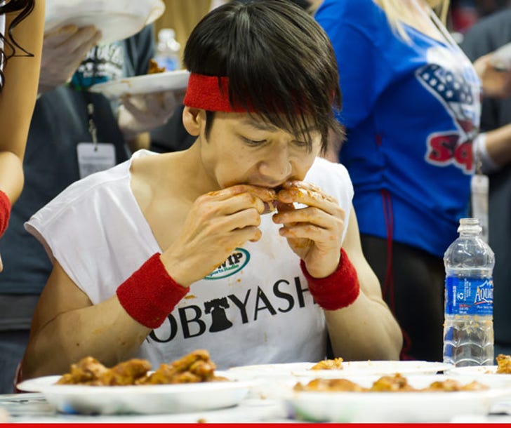 Kobayashi DOMINATES Wing Bowl -- Hundreds of Chickens Can't Cross :: 0203-hot-wings-getty