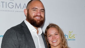 Ronda Rousey and Travis Browne