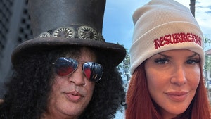 Slash and Perla Ferrar Getty INSTA 1