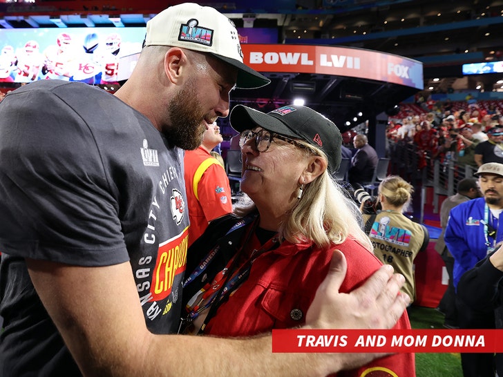 Travis and Jason Kelce Share Hug on the Super Bowl Field