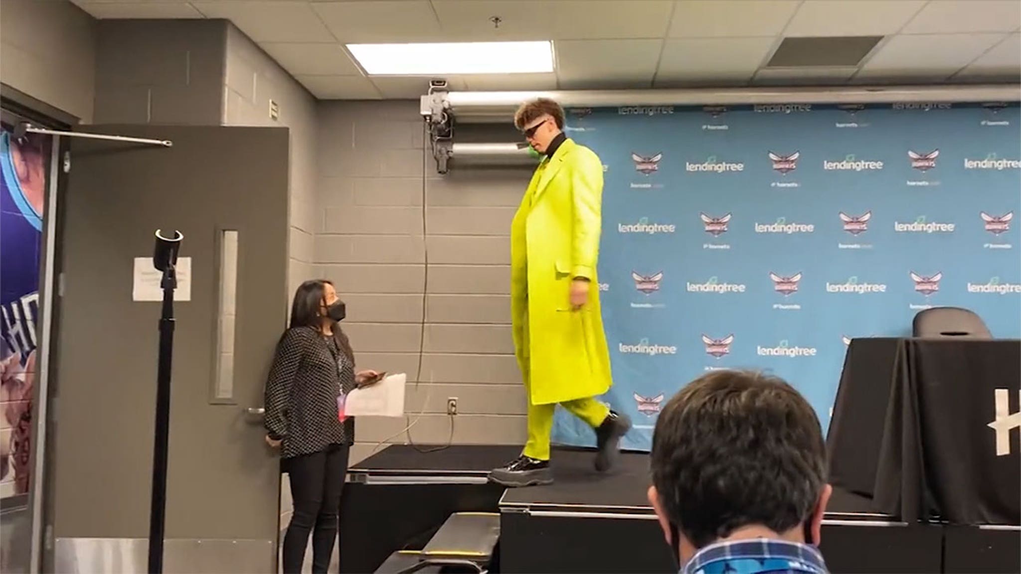 LaMelo Ball's neon outfit after Charlotte's win against Pacers