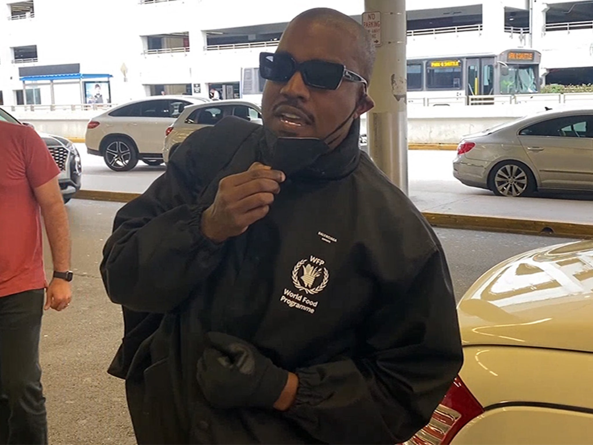 Kanye West Lectures Paparazzi About Milking His Image, Leaves Miami