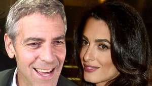 George and Amal Clooney Handed Out Noise-Canceling Headphones on Flight