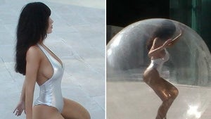 0811-Bianca-Censori-Silver-Leotard-And-Stilletos-PRIMARY