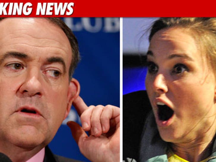 0304-huckabee-portman-bn-getty-01