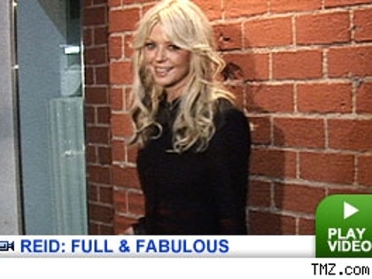 Tara Reid: Click to watch