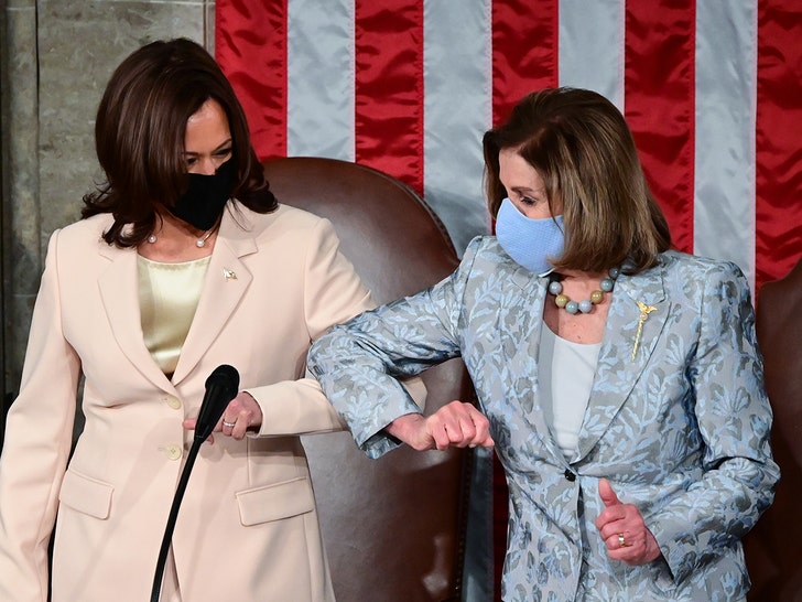 0428-kamala harris nancy pelosi-fist bump-getty