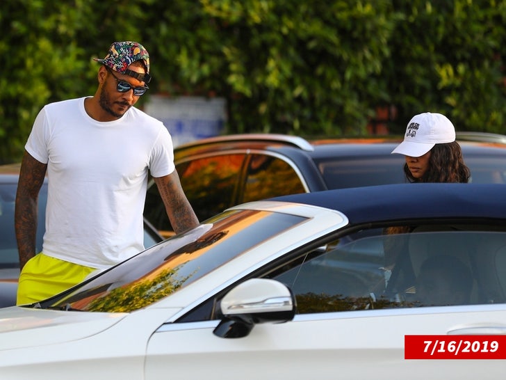 Lala Anthony and Carmelo Anthony by car