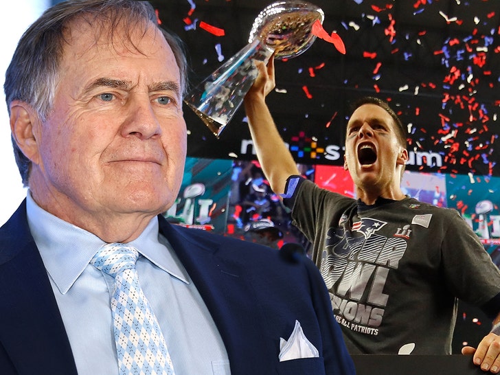 bill belichick tom brady holding up lombardi trophy