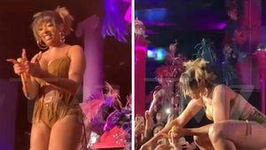 Megan Thee Stallion Pours Liquor Down Fan's Mouth at Coachella Event