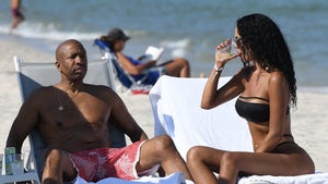Kenny Smith Ditches Shirt For Beach Day With Bikini Beauty