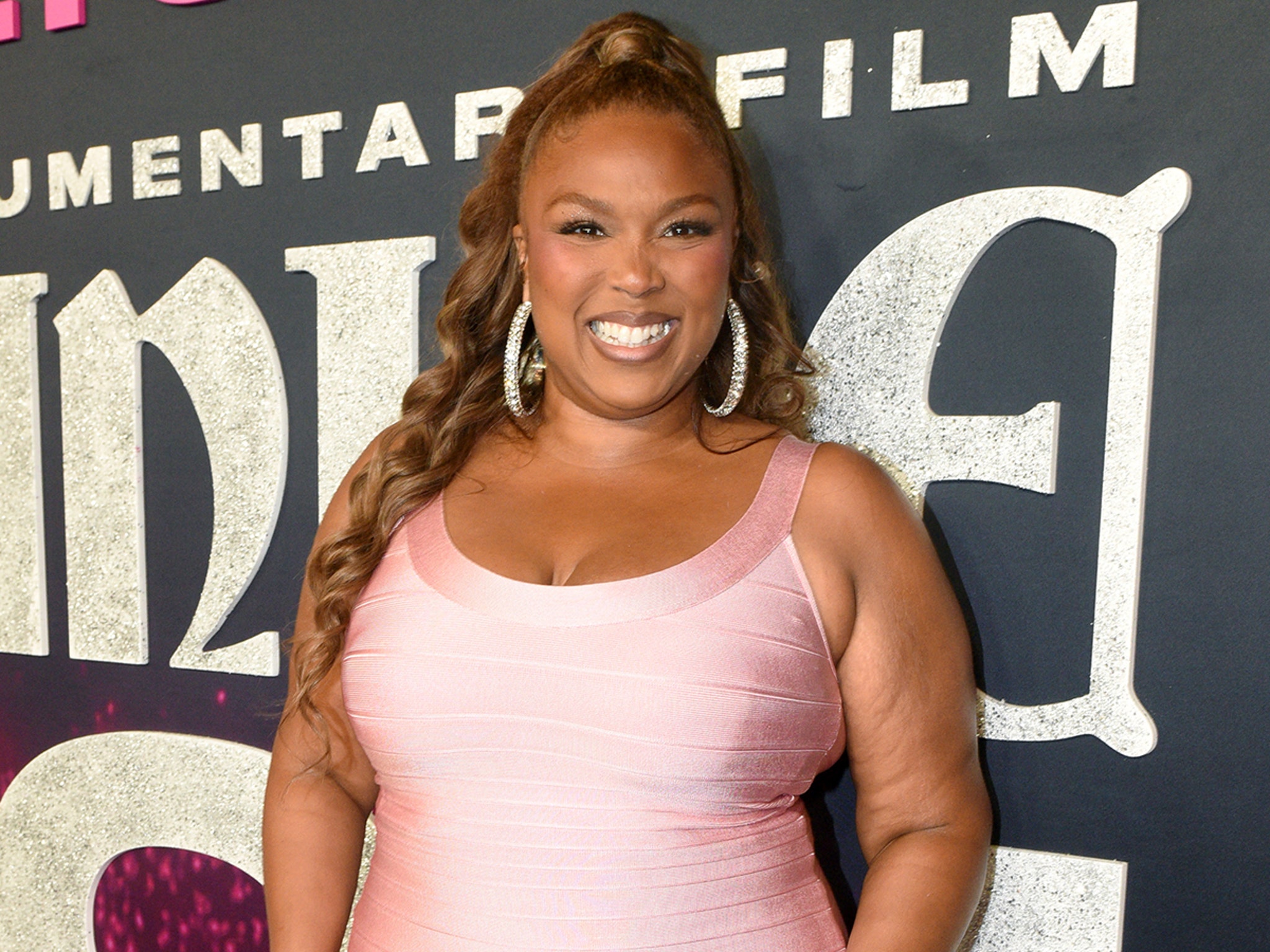 lizzo pink dress Lizzo Shows Off Weight Loss in Tiny Dress at Paris Hilton's Documentary  Premiere