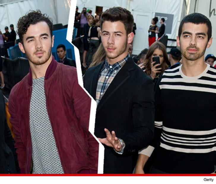 Joe and Nick Jonas -- We Don't Need All Our :: 1113-jonas-brothers-split-getty-3