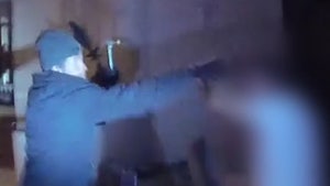 Body Cam Shows Fatal Shooting of Robbery Suspect Charging with Hammer