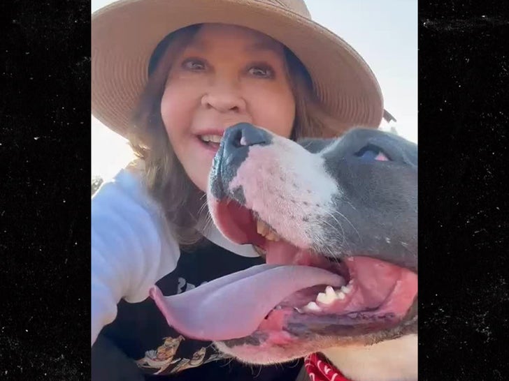 0731-Linda-Blair-With-Dogs-Sub2