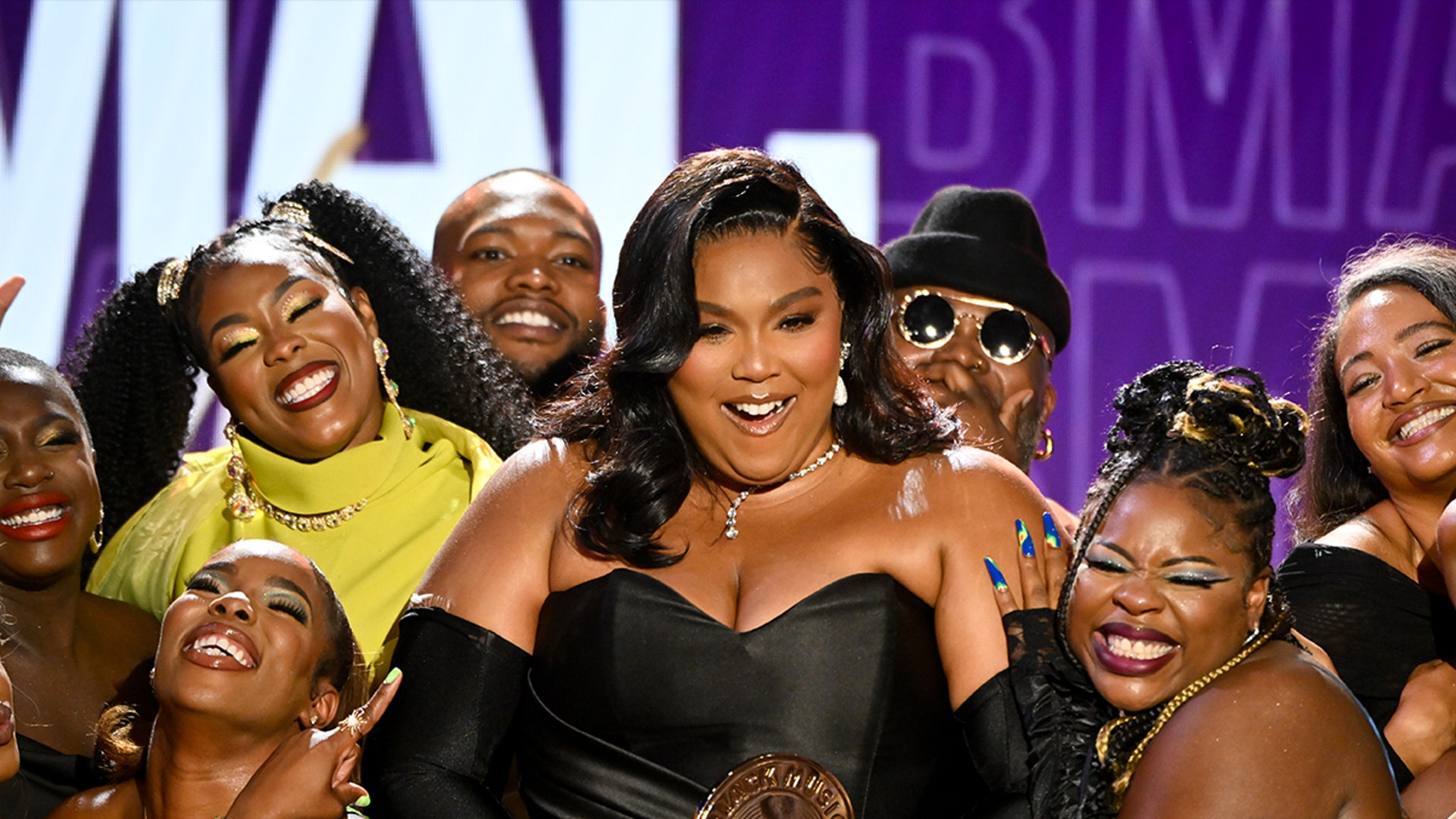 Lizzo Accepts Humanitarian Award Surrounded by Black Plus-Sized Women