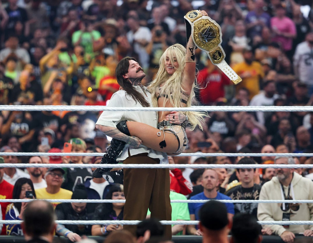 Liv Morgan celebrates her win with Dirty Dom