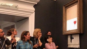 Banksy Painting Goes for $1.4 Million and then Gets Shredded in Frame