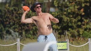 Peyton Manning Goes Topless, Hairless In Miami Beach Football Session
