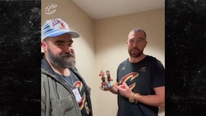 Travis and Jason Kelce Honored with Bobbleheads at Cavs Game