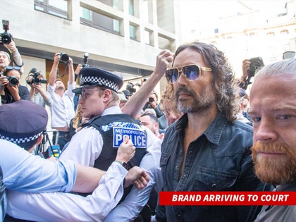 russel brand arriving court shutterstock 1