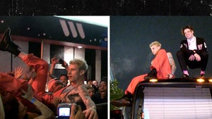 Machine Gun Kelly, Yungblud Jump on Tour Bus Roof, Perform Outside The Roxy