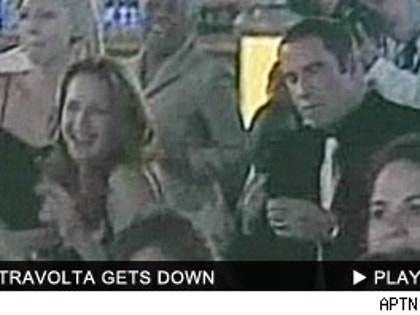 John Travolta: Click to watch