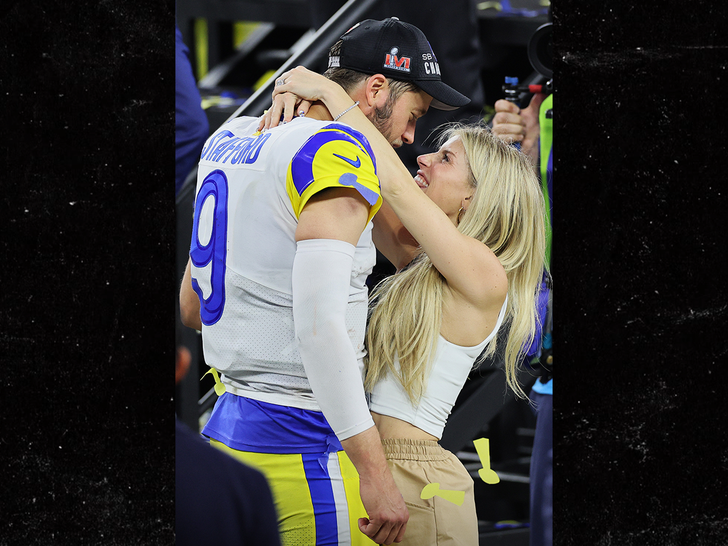 Matthew Stafford #9 of the Los Angeles Rams celebrates with his wife Kelly Stafford