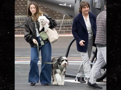 Tom Cruise and Ana De Armas Arrive On A Helicopter With Their Pets