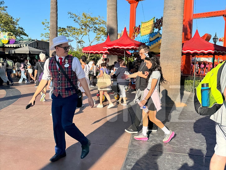 Nathan Fillion and Tania Raymonde at Disneyland tmz 1