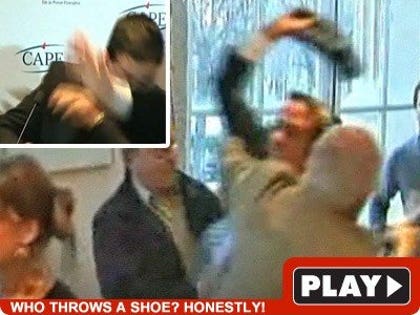 Bush Shoe thrower attack: Click to watch