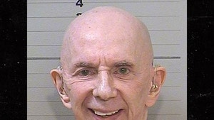 Phil Spector's New Prison Mug Shot Released, Now Totally Bald with Hearing Aids