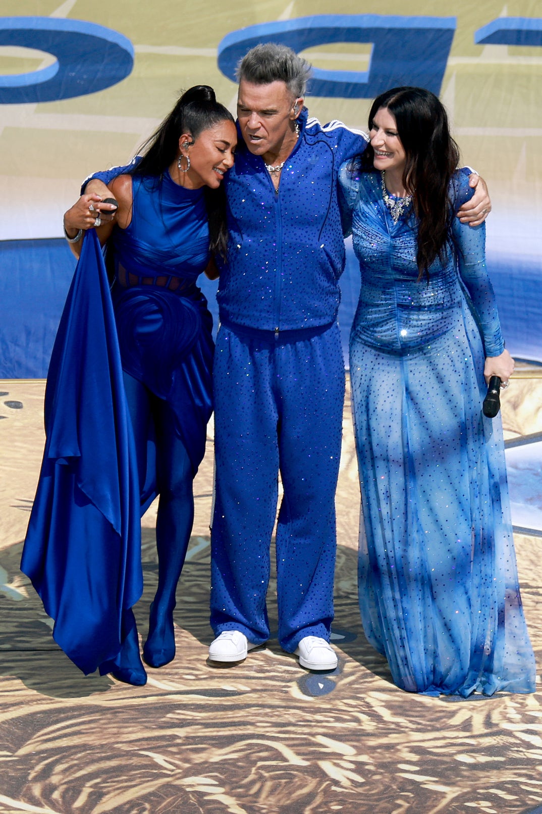 Nicole Scherzinger, Robbie Williams and Laura Pausini