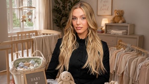 Alex Cooper with baby items Getty