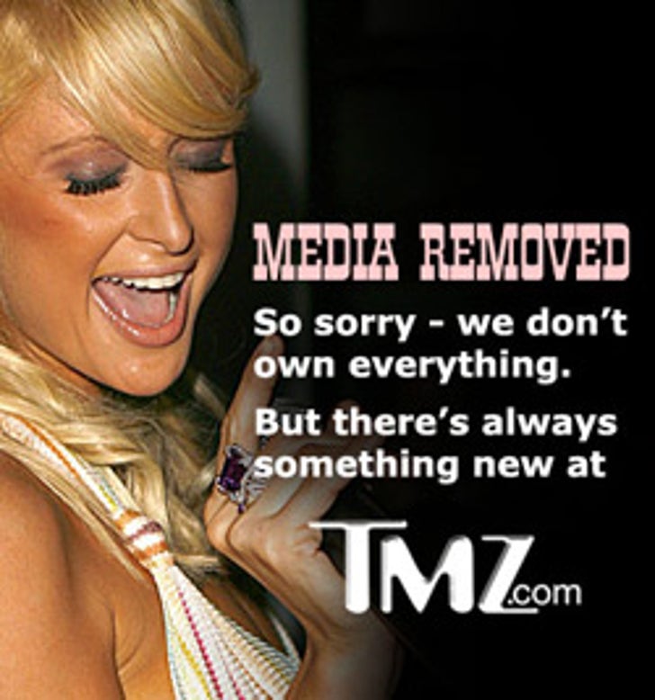 Britney Takes to the Cement Pond :: media_removed_250-1