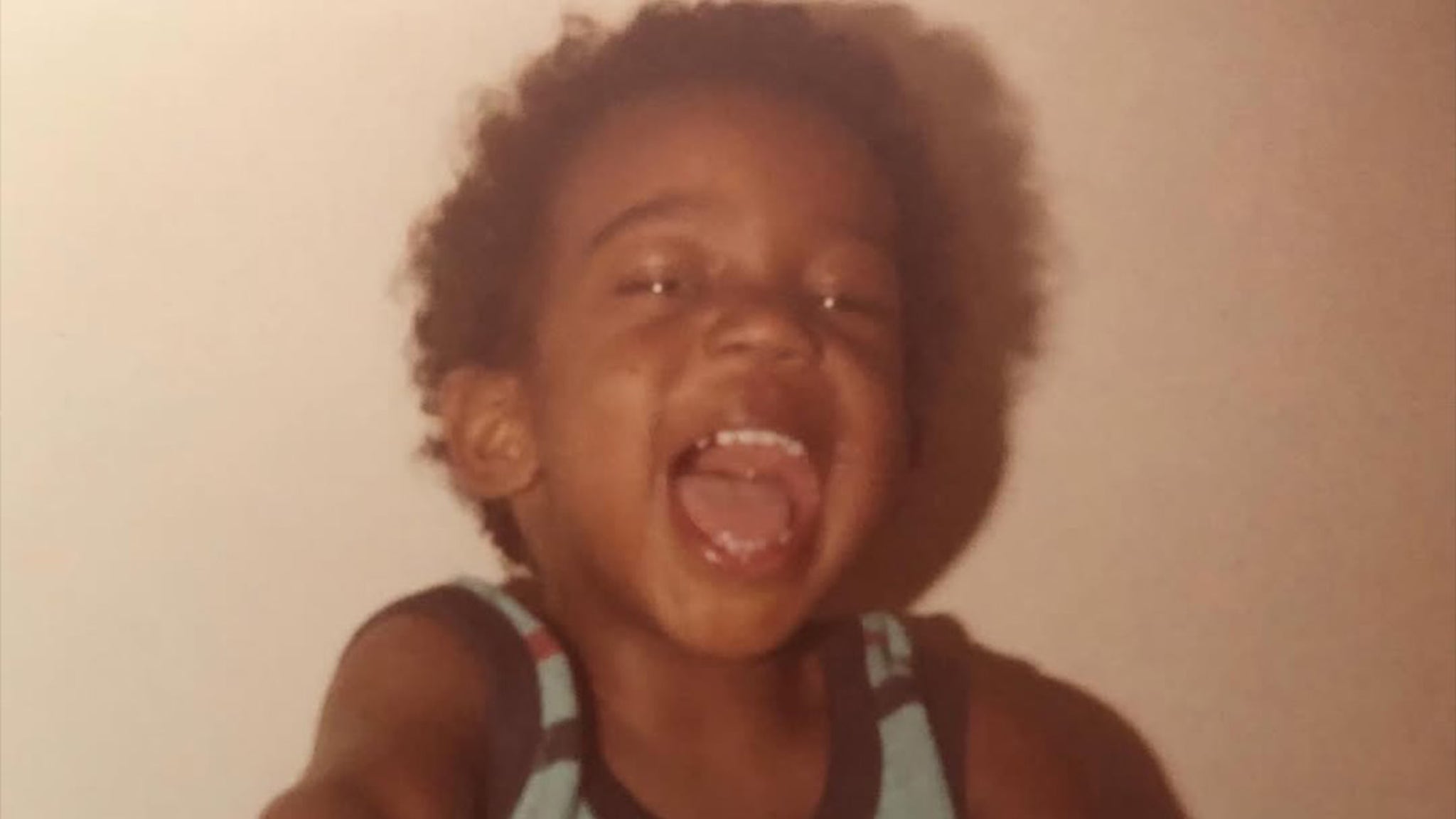 Guess Which Iconic Rapper This Cute Kid Turned Into!