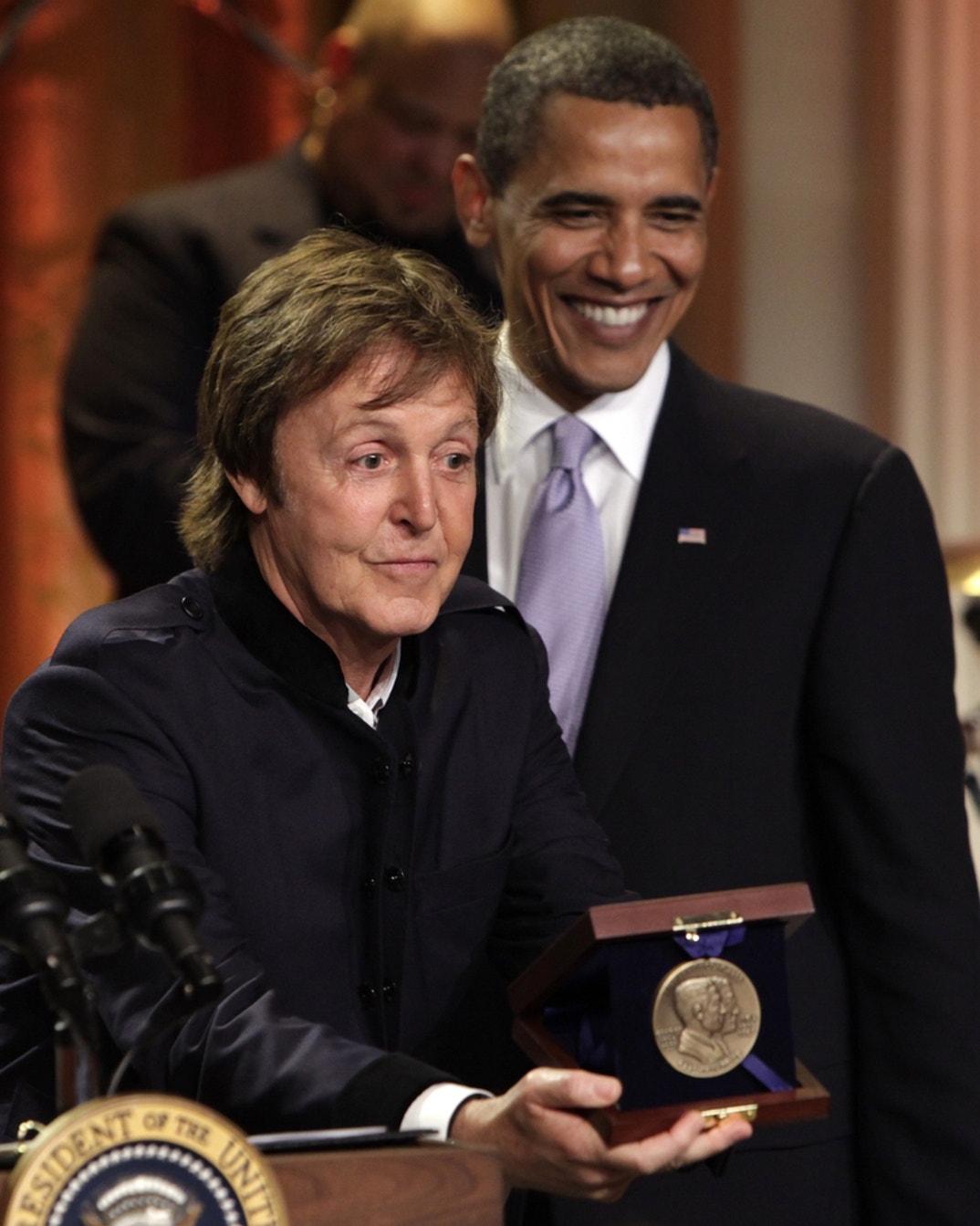 US President Barack Obama presents Paul McCartney with the third Gershwin Prize for Popular Song at the White House in Washington, DC on June 2, 2010. McCartney's appearance was part of a two-day series of events marking the award issued by the Library of Congress.