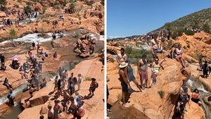 Utah's Gunlock Falls Packed with Hundreds of Young People, Families