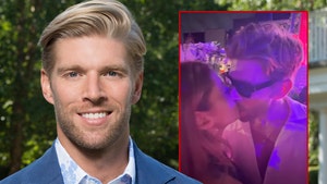 kyle cook KISSING ANOTHER GIRL GETTY COMP